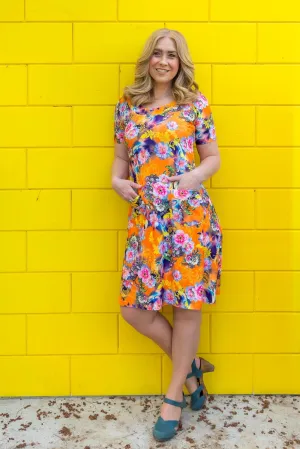 Ava dress- happy print orange summer vibe