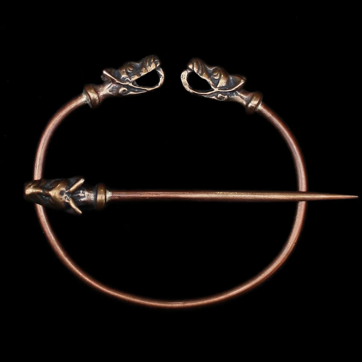 Bronze Penannular Brooch with Icelandic Wolf Heads