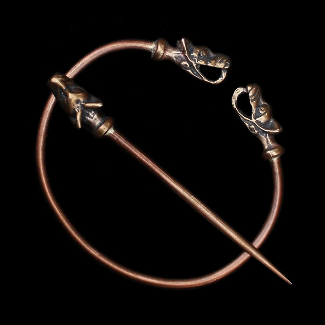 Bronze Penannular Brooch with Icelandic Wolf Heads