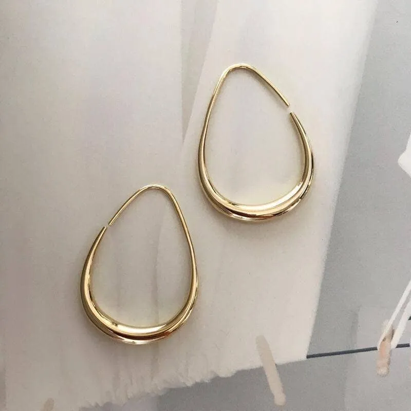 Created Diamond Simple Design of Elliptical Metal Earrings